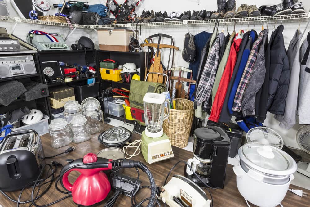 very cluttered garage in need of organization